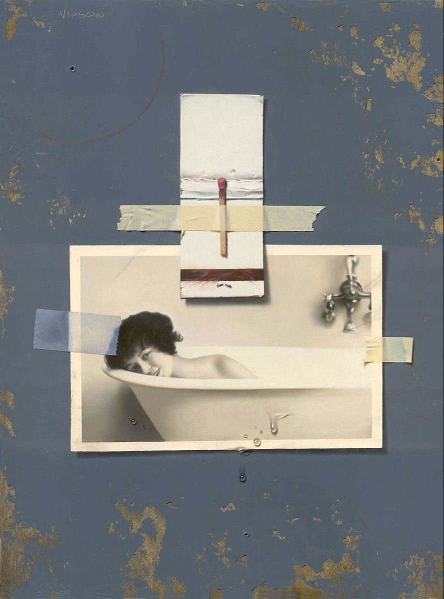 A vintage bathtub photo taped onto a distressed blue-gray board